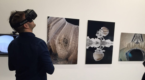 Image of Benjamin Ennemoser viewing the VR experience at an exhibition at the Bartlett School of Architecture in London
