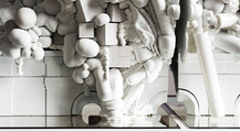 An image of a white sculpture exhibition