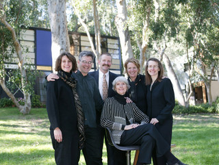 Lucia Eames and her five children shortly after she created the Eames Foundation to take care of the House