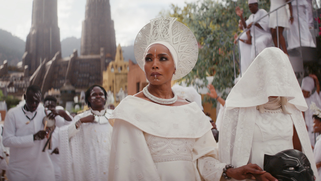 Queen Ramonda dons a crown in "Black Panther: Wakanda Forvever." Image courtesy Walt Disney Studios / Marvel 2022