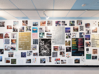 A photograph showing a series of architectural images, each on a square page, assembled across a wall like pixels