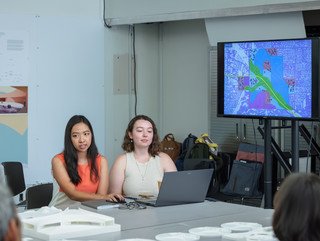 Wu and Andrews presenting during Rumble Final Review